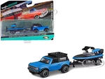 2021 Ford Bronco Blue with Black Top and Roof Rack and Ski Boat with Trailer Blue and Black "Tow &amp; Go" Series 1/64 Diecast Model Car by Maisto