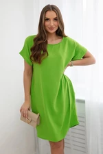 Dress with light green pockets