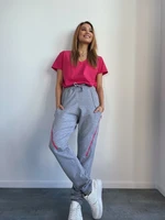 Light grey sweatpants with trim elements