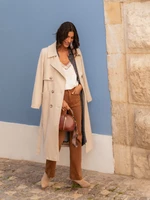 Beige double-breasted coat with Blue Shadow belt