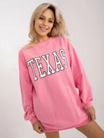 Pink long loose sweatshirt with inscription and pockets