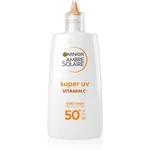 Garnier Ambre Solaire Super UV lehký ochranný fluid proti tmavým skvrnám s vitaminem C SPF 50+ 40 ml