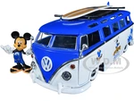 Volkswagen T1 Bus Blue and White with Graphics "Nostalgic Islands Ride the Wave" and Mickey Mouse Diecast Figure and Surfboard "Disneys Mickey and Fr