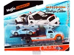 2019 Ford GT 9 Heritage Edition with Flatbed Truck Light Blue and Orange "Elite Transport" Series 1/64 Diecast Model Cars by Maisto