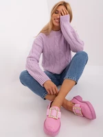 Light purple cable knit sweater with long sleeves