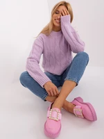 Light purple cable knit sweater with long sleeves