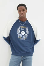 Trendyol Indigo Men's Oversized Raglan Sleeve Color Block Crew Neck Printed Cotton Sweatshirt.