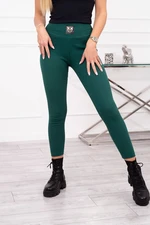 Ribbed leggings with a high waist of dark green color