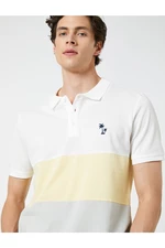 Tričko Koton Color Block s potlačou dlane a gombíkmi, tričko s krátkym rukávom s polo výstrihom.