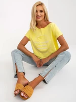 One-size yellow blouse of loose cut with short sleeves