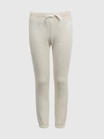 Beige girls' sweatpants with the GAP logo