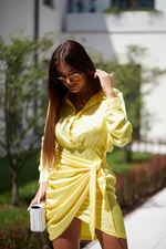 Yellow shirt dress with tie at the front