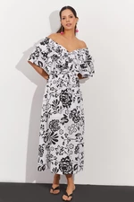 Fajna i seksowna damska biało-czarna falbana sukienka midi z przodu i z tyłu w kształcie litery V