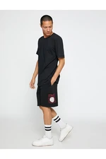 Koton Basic Sports Shorts with Asian Print with a drawstring waist and pocket.