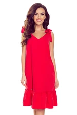 Dress with a bow on the shoulders and a Numoco ruffle
