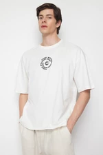 Trendyol Ecru Oversize/Wide Cut 100% Cotton T-shirt with Text Embroidery