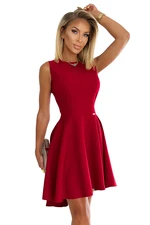 Elegant dress with a longer back Numoco