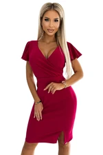 Dress with a clutch neckline, sleeves and a Numoco belt