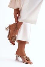 Transparent high-heeled flip-flops with gold S embellishments. Barski