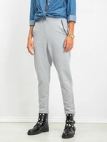 Grey trousers with zippers