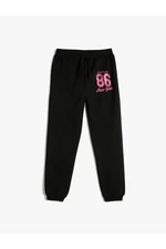 Koton Jogger Sweatpants with Tie Waist and Glitter Print Detail