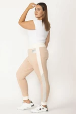 Şans Women's Plus Size Powder Gray Sport Pants with Ribbed Side Stripes and a Wide Belt.