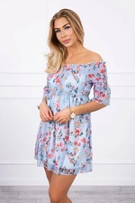 Dress on shoulders with floral pattern of azure color
