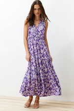 Trendyol tmavě fialové květinové áčkové šaty s výstřihem do V bez rukávů z polyesteru.