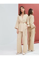 Koton Fabric Palazzo Trousers with Pockets, Belted Waist and Pleated. Koton Fabric Palazzo Trousers with Pockets, Belted Waist and Pleated.