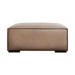 Skórzany podnóżek Madame – Windsor & Co Sofas