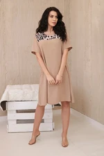 Dress with an animal motif in beige color