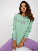 Light green hoodie with print